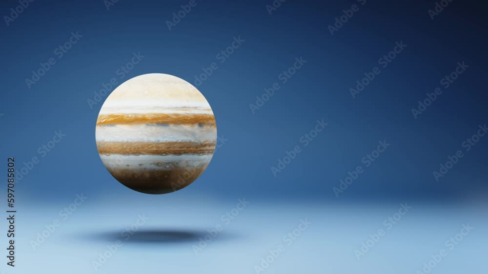 Jupiter Planet Spinning on a Studio Blue Background, Seamless Loop 3D Animation with Copy Space Jupiter Planet Spinning on a Studio Blue Background, Seamless Loop 3D Animation with Copy Space