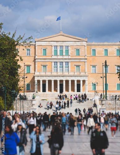 Greek Parliament in Old Royal Palace building facade exterior, Hellenic Bouleterion parliament house on Syntagma square, Athens, Attica, Greece in a summer day photo