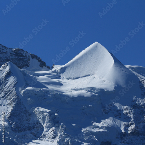 Snow covered peak of Mount Silberhorn, Switzerland. photo