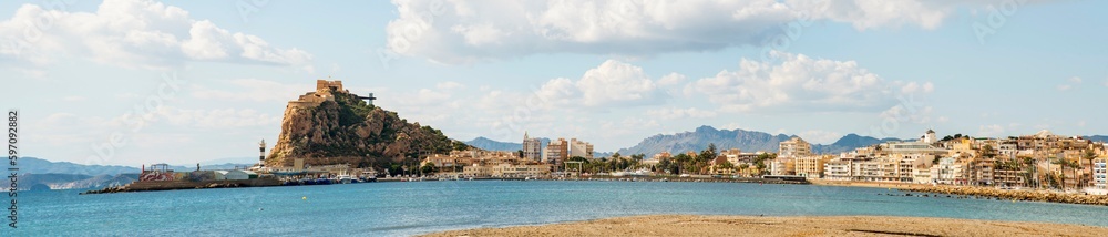Panoramic of the beach of Delicias with the mill and the castle of Aguilas, Spain