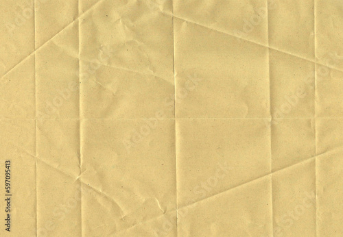 Beige textured paper sheet with geometric folds
