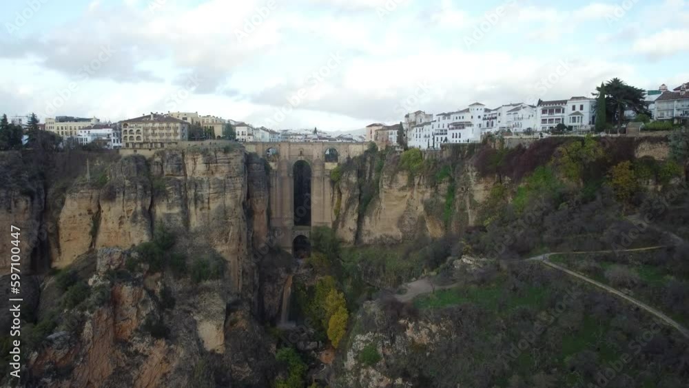 Majestic Ronda city on steep cliff side in Spain, aerial drone view Majestic Ronda city on steep cliff side in Spain, aerial drone view