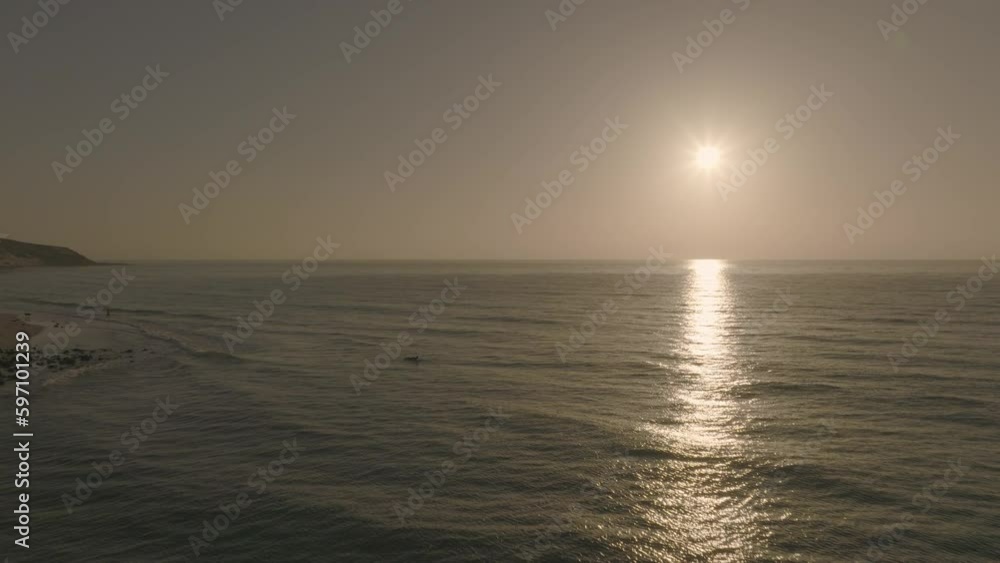 apple prores 422 flying with drone dji mavic 3 cine flat over the atlantic into sunrise sunset with beach, coast and rocks in background apple prores 422 flying with drone dji mavic 3 cine flat over the atlantic into sunrise sunset with beach, coast and rocks in background