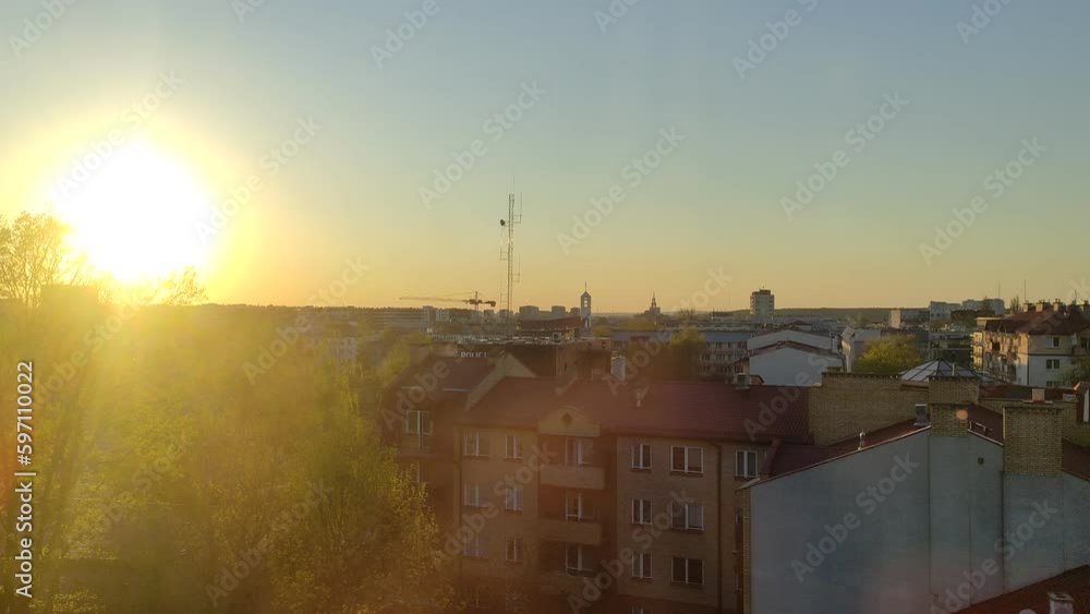 Sunset over a city. Spring, evening and good weather Sunset over a city. Spring, evening and good weather