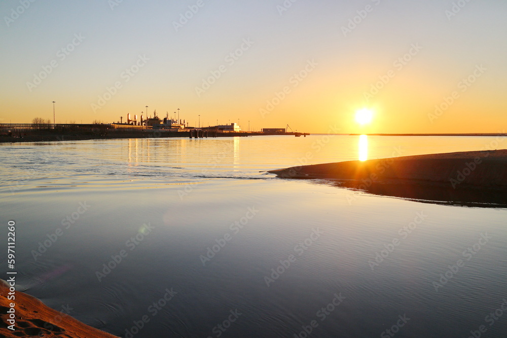 Sunset over the sea coast in the city Sunset over the sea coast in the city