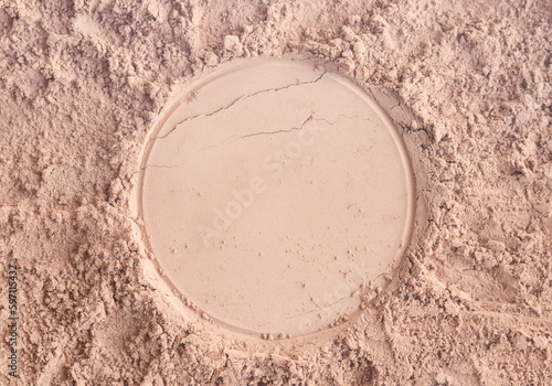 Compact face powder (blusher) texture close-up. Make-up background. Selective focus, copy space.