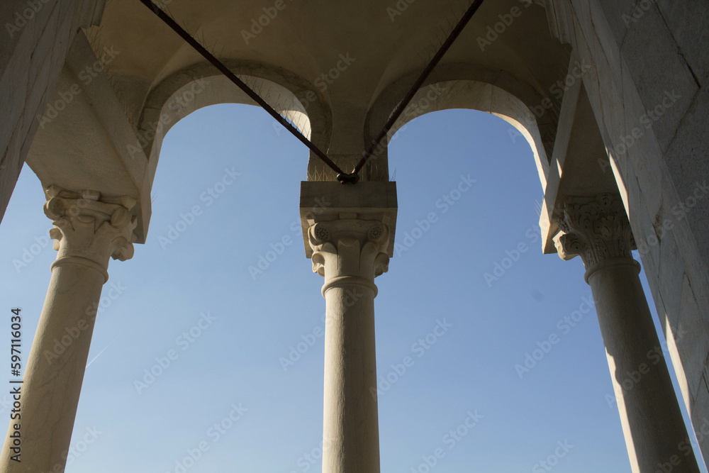 evocative image of a detail of the leaning tower of Pisa in the square
of Miracles under a clear sky evocative image of a detail of the leaning tower of Pisa in the square
of Miracles under a clear sky