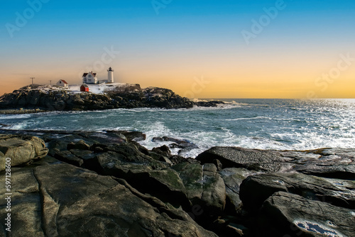 lighthouse on the coast at sunrise, sunset. Seascape photography. photo