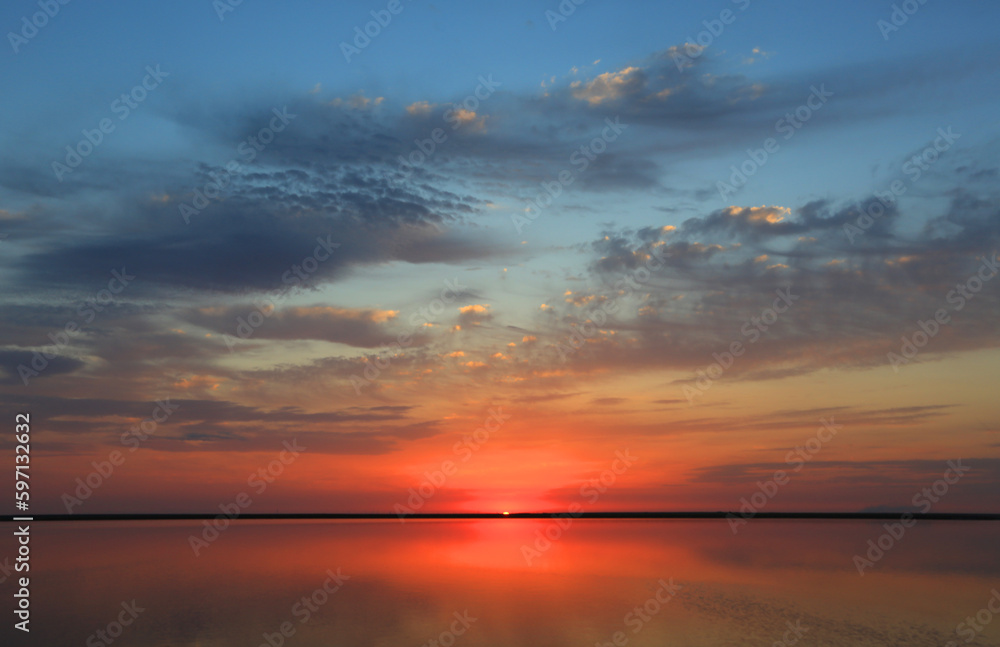 Fototapeta premium hot sunset over lake