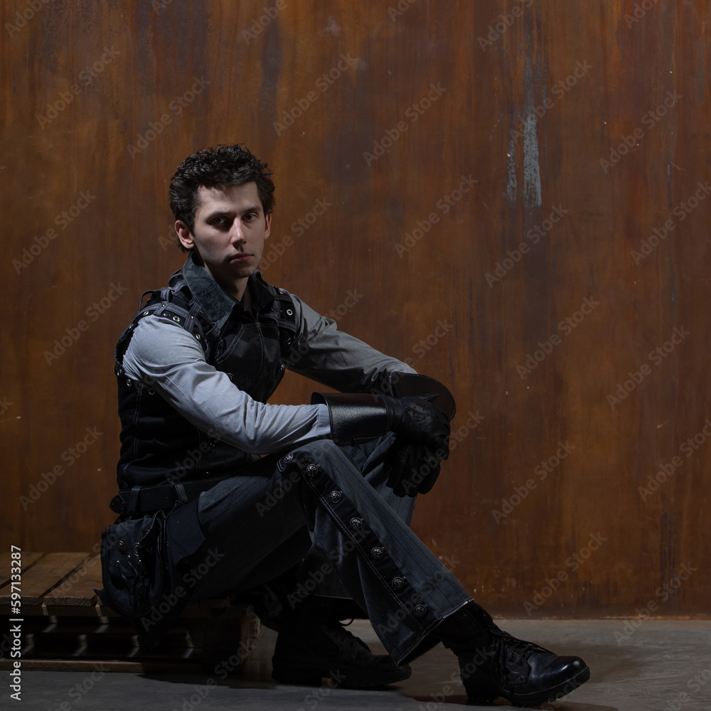 A young man in a Victorian-style suit, a retro character. A young man in a Victorian-style suit, a retro character.