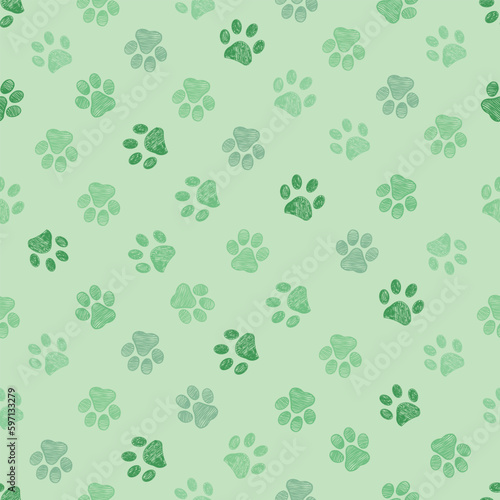 Green colored paw prints seamless fabric design