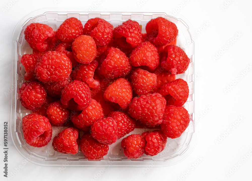 close up fresh raspberries on white background close up fresh raspberries on white background