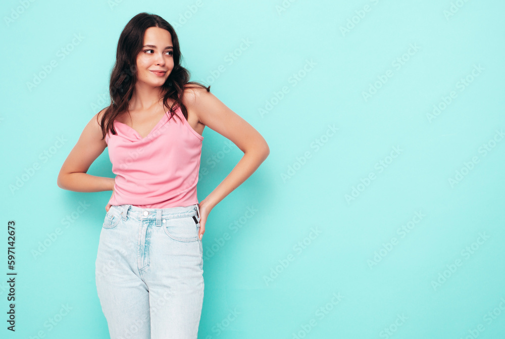 Young beautiful smiling female in trendy summer clothes. Sexy carefree woman isolated in studio. Positive model having fun. cheerful and happy Young beautiful smiling female in trendy summer clothes. Sexy carefree woman isolated in studio. Positive model having fun. cheerful and happy