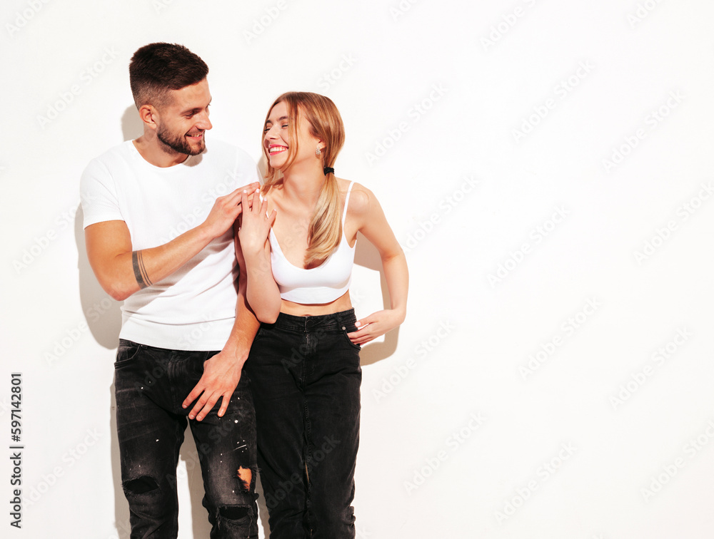 Sexy smiling beautiful woman and her handsome boyfriend. Happy cheerful family having tender moments. Young passionate couple hugging. Sensual pair isolated Sexy smiling beautiful woman and her handsome boyfriend. Happy cheerful family having tender moments. Young passionate couple hugging. Sensual pair isolated