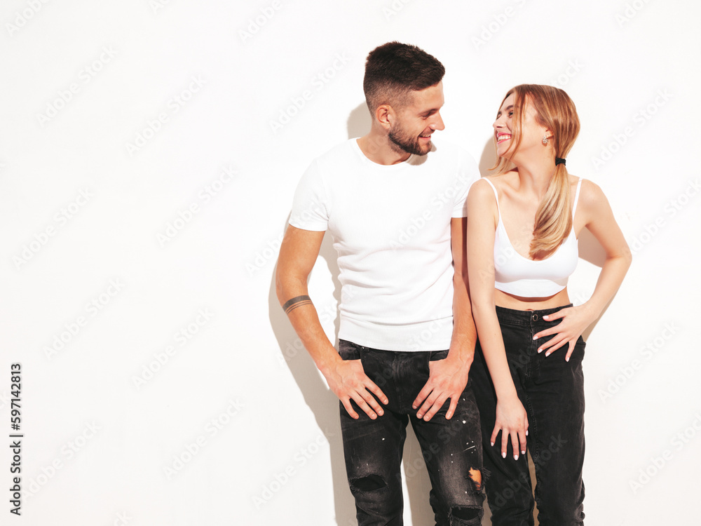Sexy smiling beautiful woman and her handsome boyfriend. Happy cheerful family having tender moments. Young passionate couple hugging. Sensual pair isolated Sexy smiling beautiful woman and her handsome boyfriend. Happy cheerful family having tender moments. Young passionate couple hugging. Sensual pair isolated