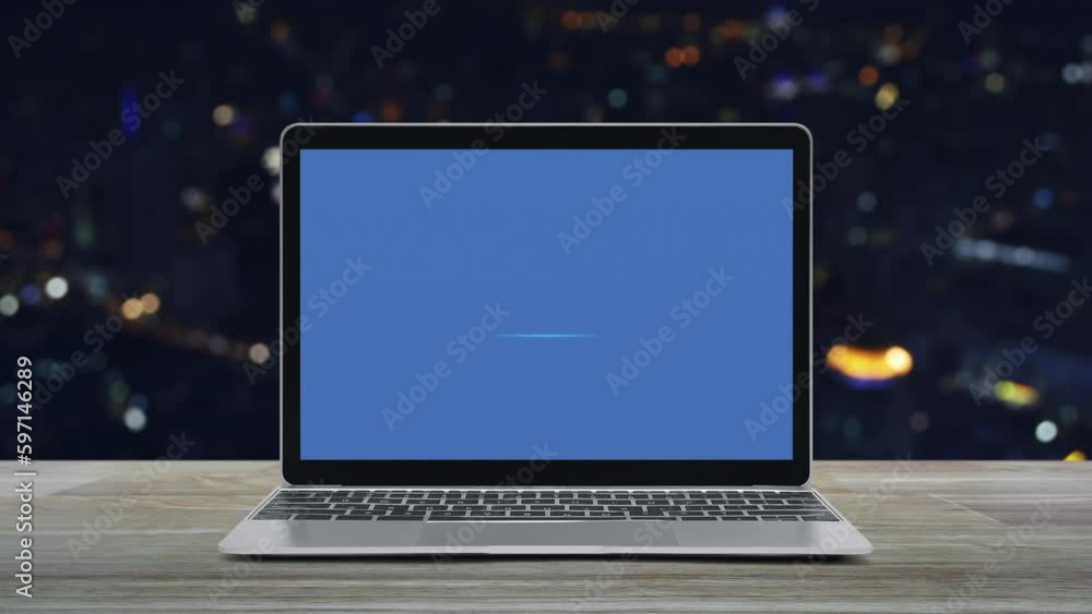 Bank flat icon on modern laptop computer monitor screen on wooden table over blur colorful night light office city tower and skyscraper, Business banking online concept Bank flat icon on modern laptop computer monitor screen on wooden table over blur colorful night light office city tower and skyscraper, Business banking online concept