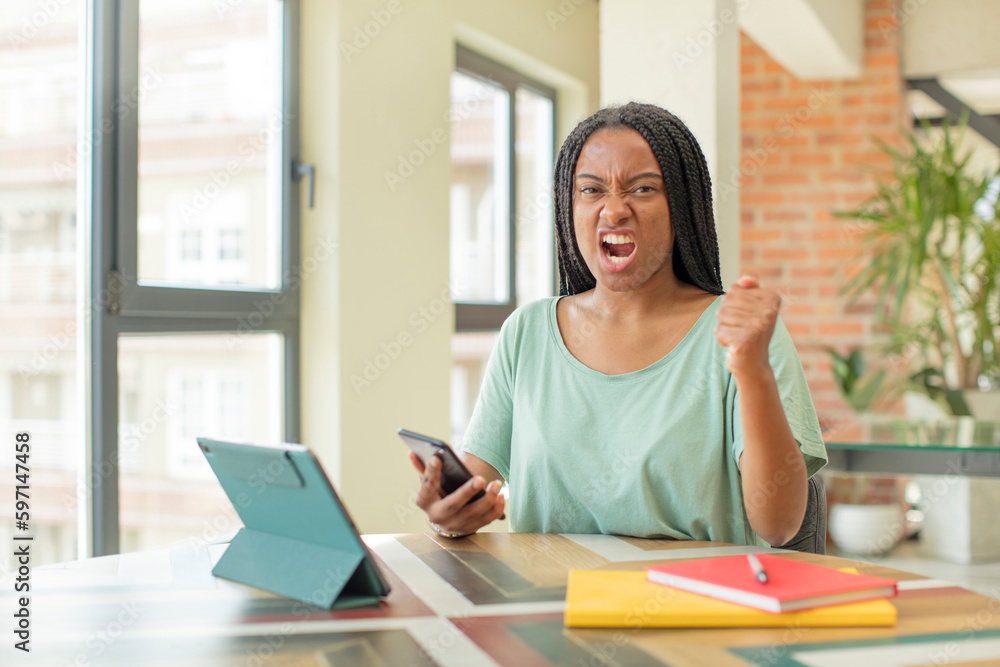 black afro woman looking angry, annoyed and frustrated. studying concept black afro woman looking angry, annoyed and frustrated. studying concept