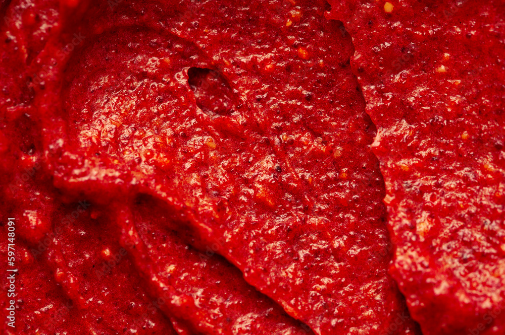 Berry yoghurt ice cream. Smoothies from fresh fruits and berries. Ice cream texture. Delicious sweet dessert close-up as a background. Berry yoghurt ice cream. Smoothies from fresh fruits and berries. Ice cream texture. Delicious sweet dessert close-up as a background.