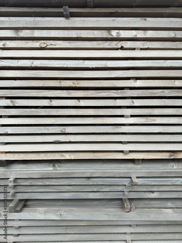 Wooden planks of wood stacked up to dry Wooden planks of wood stacked up to dry