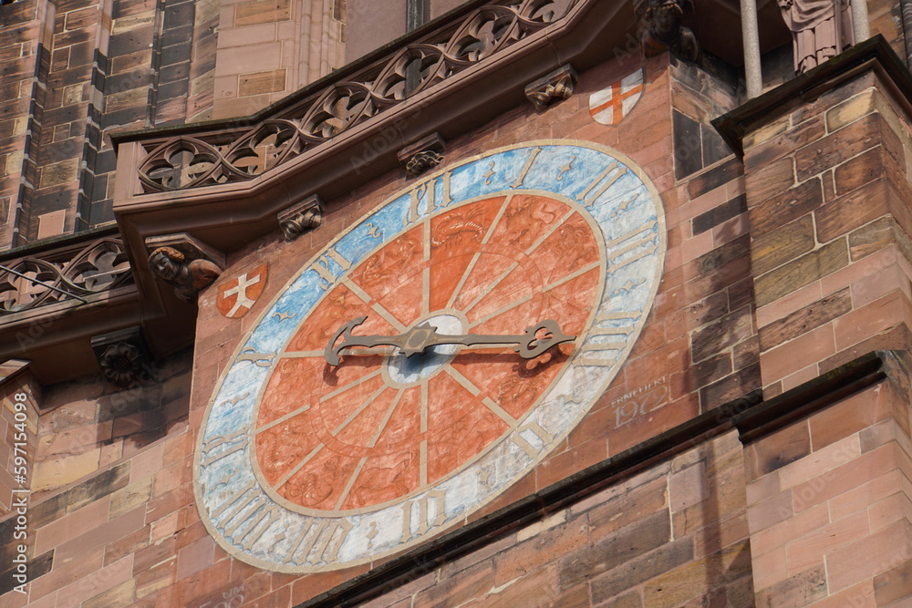 clock on the wall of the church