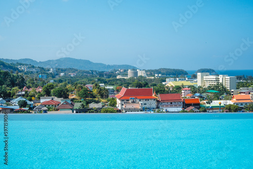 Swimming pool and city view by the sea