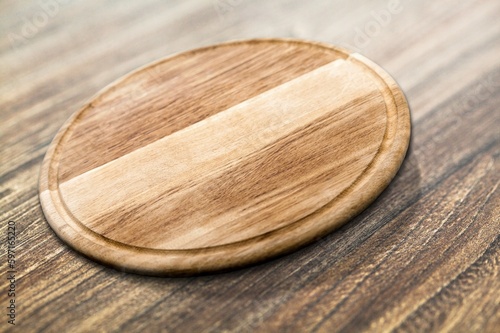 Blank wooden board on desk background