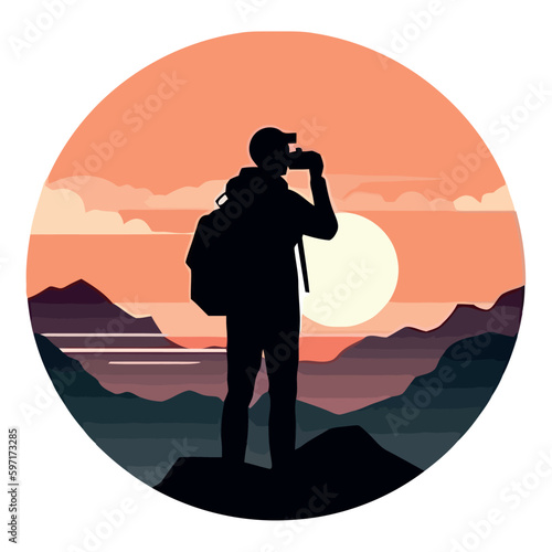 man standing on mountain peak watching sunset