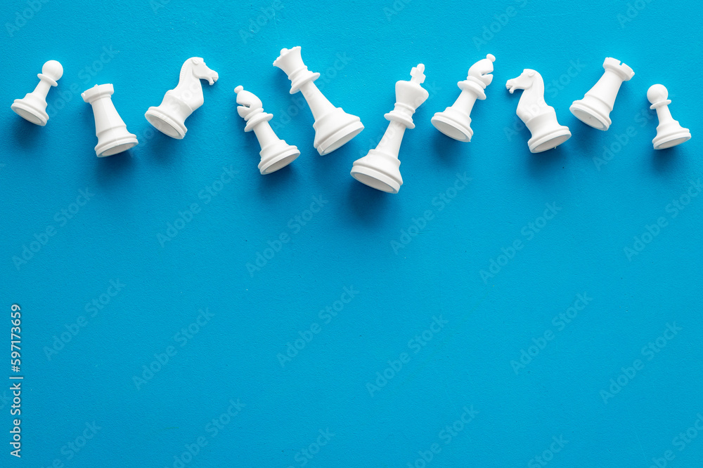 Chess pieces top view as business competition and leadership concept Chess pieces top view as business competition and leadership concept