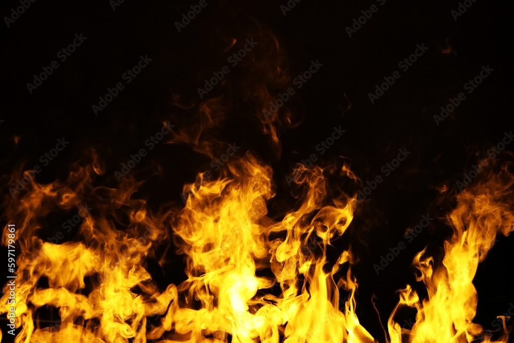 Flames to prepare a grill or barbecue, or to heat