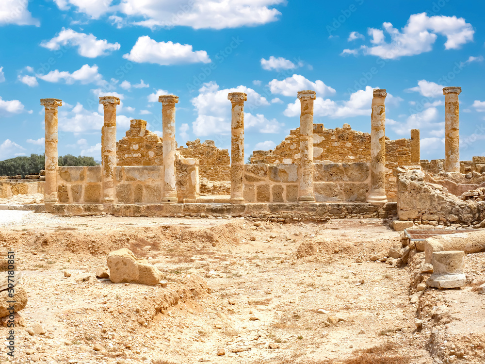 Republic of Cyprus. Paphos city. Excavations of ancient settlement. Museum complex with columns. Territory of archaeological park. Medieval city in Cyprus. Paphos under blue sky. Museums in Cyprus