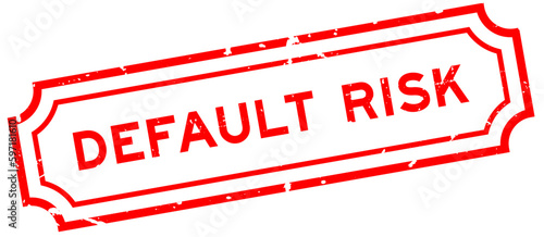 Grunge red default risk word rubber seal stamp on white background