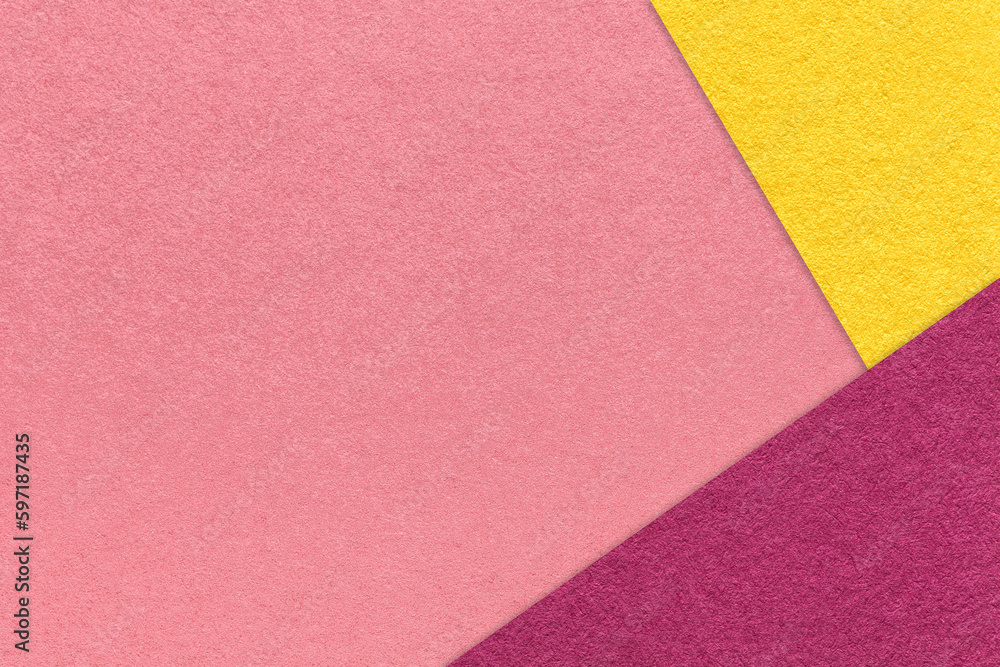 Texture of craft dark pink color paper background with yellow and purple border. Vintage abstract rose cardboard. Texture of craft dark pink color paper background with yellow and purple border. Vintage abstract rose cardboard.