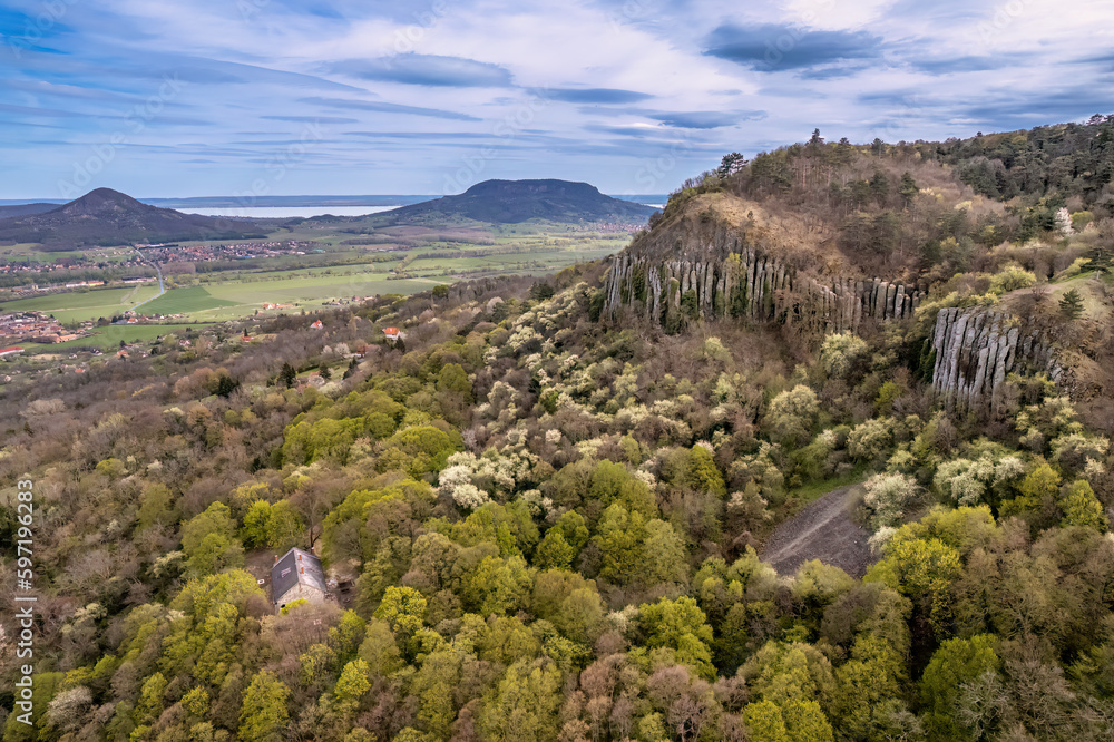 Szent György Mountain's basalt organs with the surrounding volcanic mountains in the Balaton Uplands of Hungary during spring 