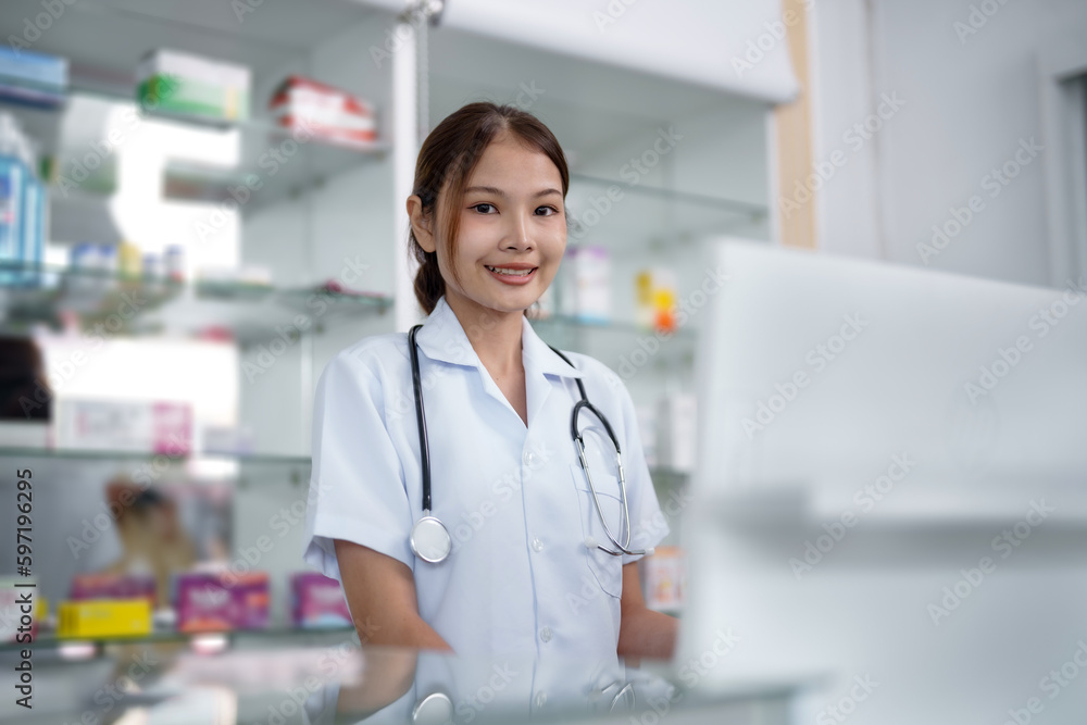 Asian woman pharmacist working at Pharmacy Drugstore . Medical healthcare concept