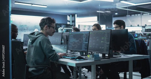 Plakat w ramie Team of Diverse Multiethnic Software Developers Working on Computers, Programming Advanced Code, Managing Artificial Intelligence Projects Online for Innovative Cyber Security Service
