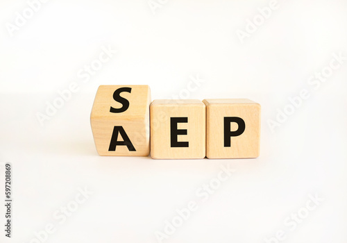 SEP or AEP symbol. Concept words AEP annual enrollment period SEP special enrollment period. Beautiful white table white background. Medical annual or special enrollment period concept. Copy space.