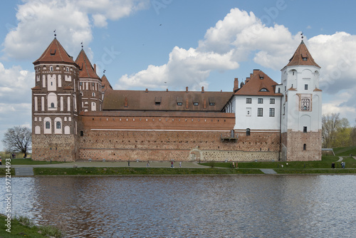 medieval Mir Castle on the shore of the reservoir