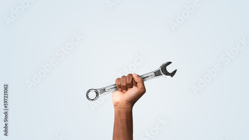 Holding tools in hand. Happy labor day concept.
