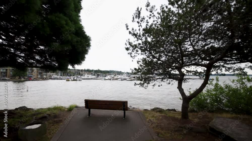 Empty Park Bench Along the Waterfront in Kirkland WA Empty Park Bench Along the Waterfront in Kirkland WA