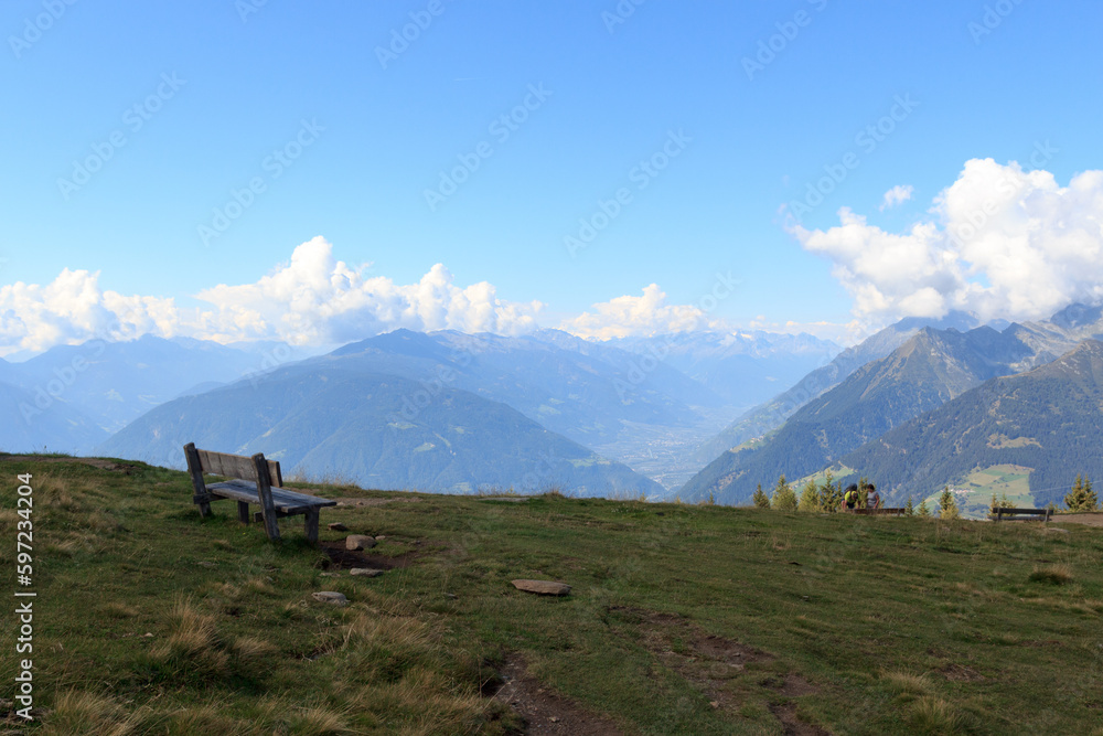 Mountain panorama view and bench seen from mountain Hirzer in Saltaus, South Tyrol, Italy
