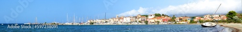 Panoramic view of the page and the marina of the famous seaside resort of Saint Florent, capital of the Nebbio region in Corsica, nicknamed the Island of Beauty