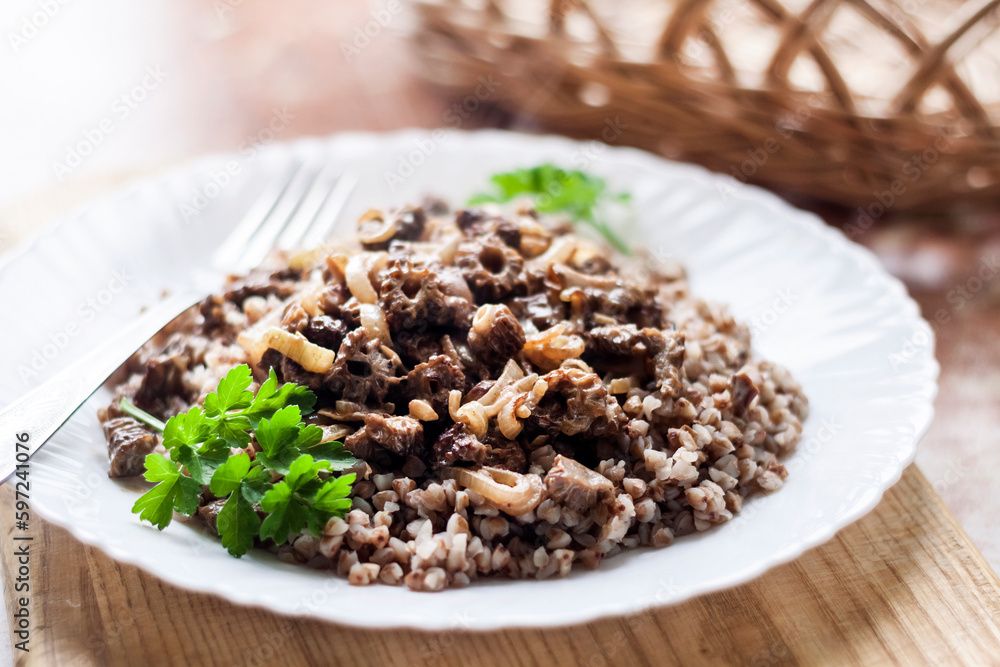 Spring Morel mushrooms stewed in sour cream, served with buckwheat Spring Morel mushrooms stewed in sour cream, served with buckwheat