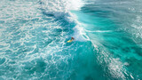 Surfer on the wave in Hawaii aerial
