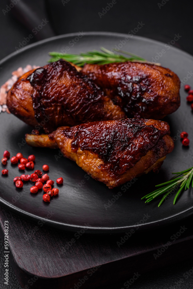 Delicious grilled chicken legs with spices and herbs in teriyaki sauce Delicious grilled chicken legs with spices and herbs in teriyaki sauce