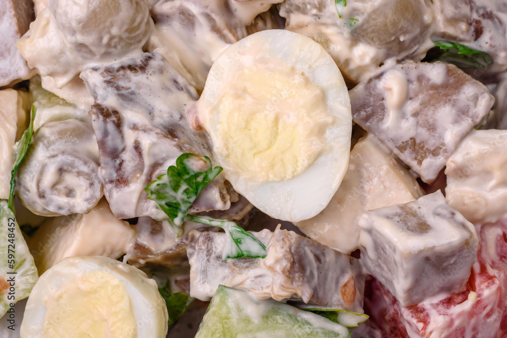 Delicious salad with boiled beef tongue, quail eggs, tomatoes and cucumber Delicious salad with boiled beef tongue, quail eggs, tomatoes and cucumber