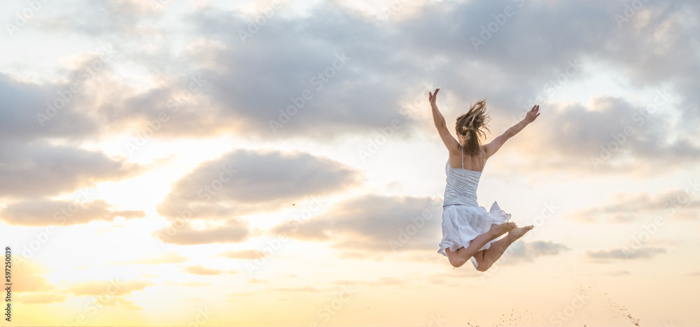 Happy beautiful young girl jumping Happy beautiful young girl jumping
