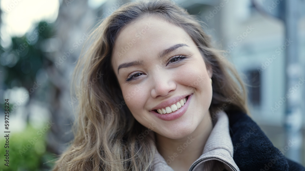 Young beautiful hispanic woman smiling confident standing at street Young beautiful hispanic woman smiling confident standing at street