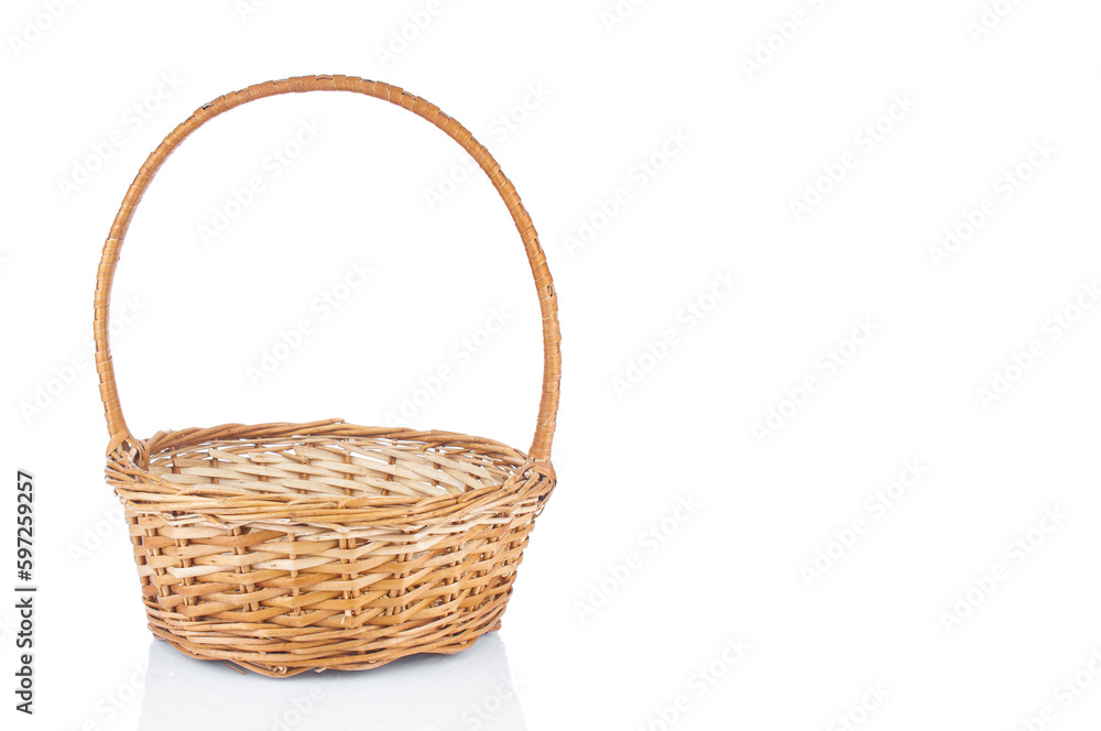 Wicker basket close up isolated on white background