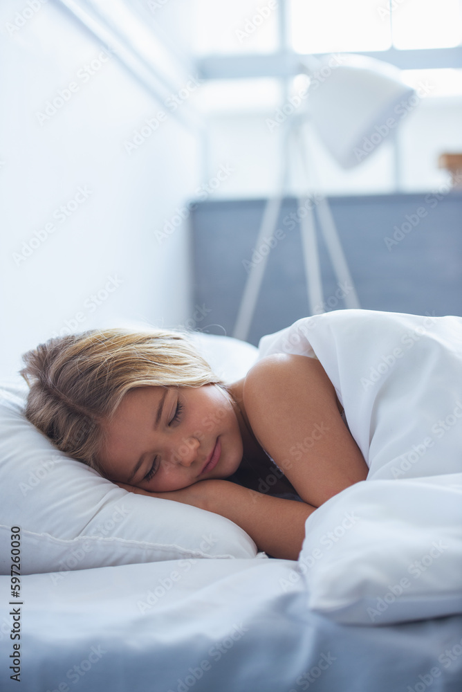 Fototapeta premium Cute little girl in bed