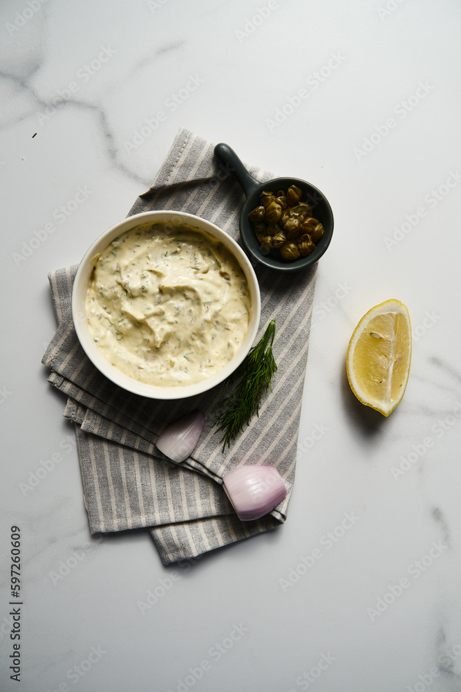 Classic Tartar Sauce dip in the bowl. Mayonnaise with dill and capers plus lemon, shallot onion. Worcester sauce and Dijon Mustard. Classic Tartar Sauce dip in the bowl. Mayonnaise with dill and capers plus lemon, shallot onion. Worcester sauce and Dijon Mustard.